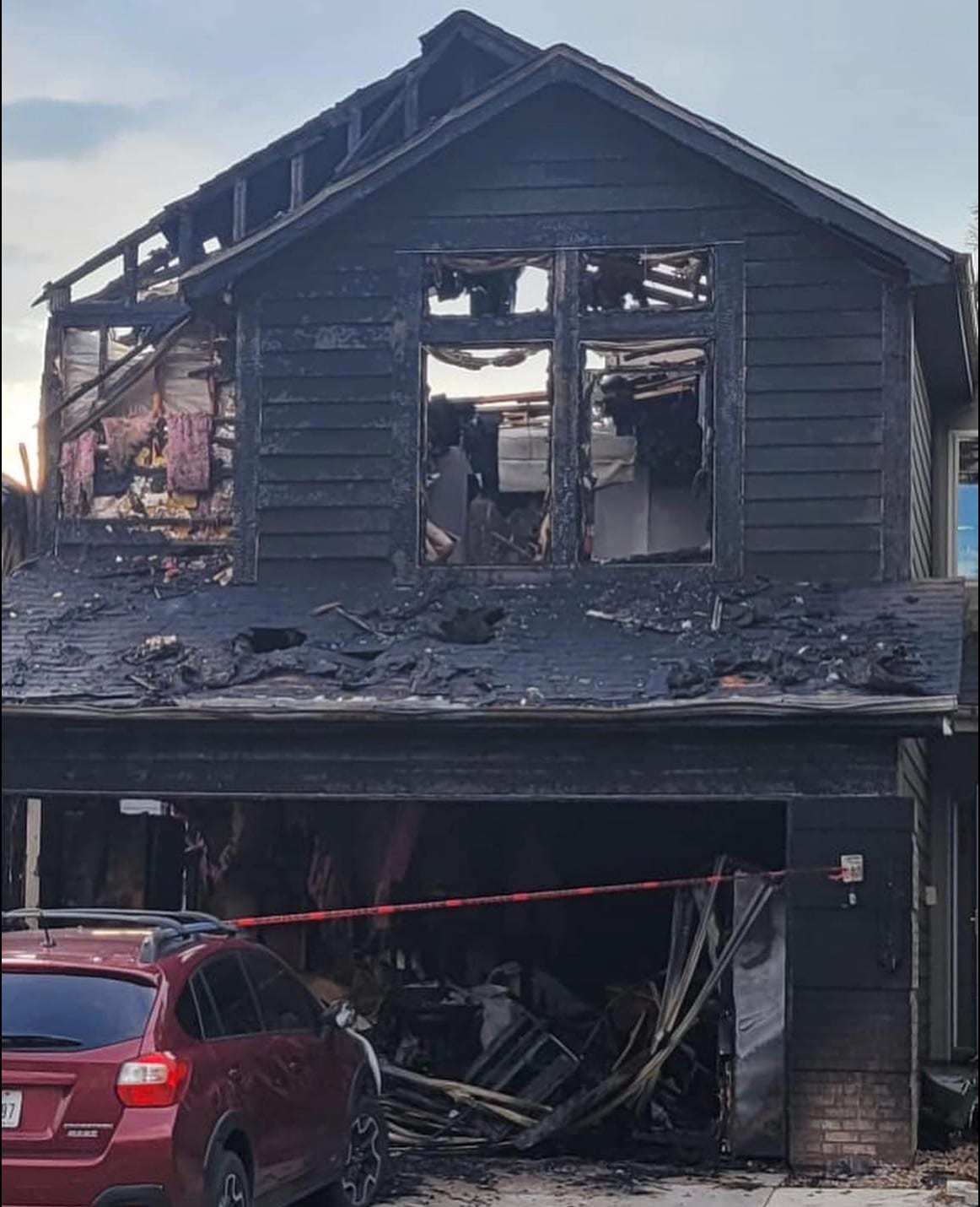 House front and garage destroyed by fire