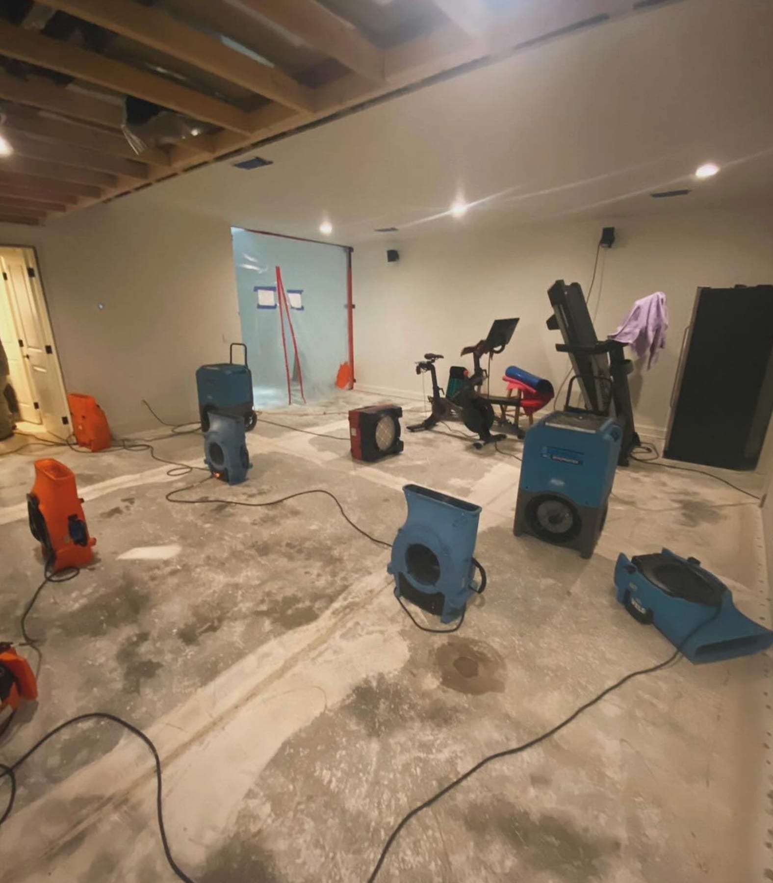 Basement drying with air movers and dehumidifiers