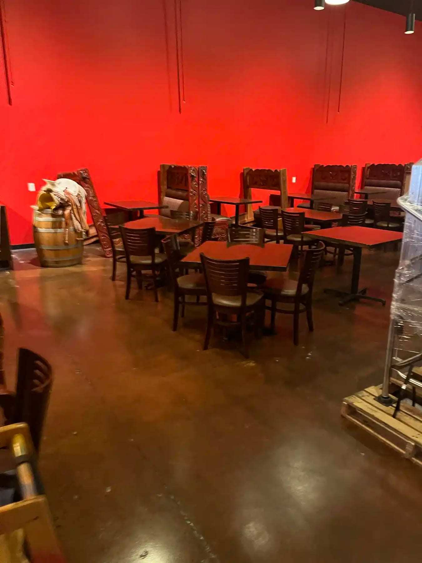 Restaurant dining room with chairs stacked on the tables